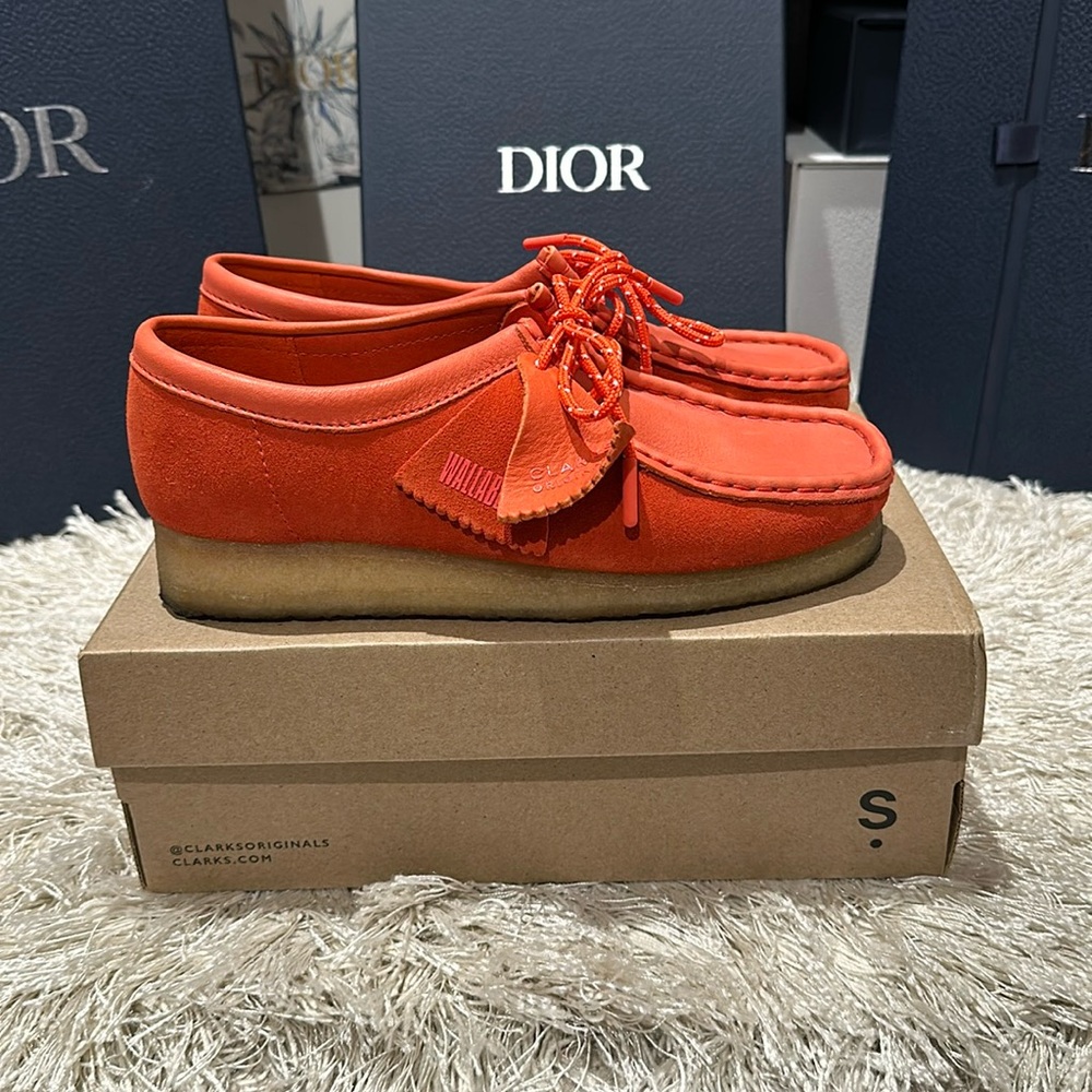 Clark Wallabee’s in red suede gently used, worn maybe twice.